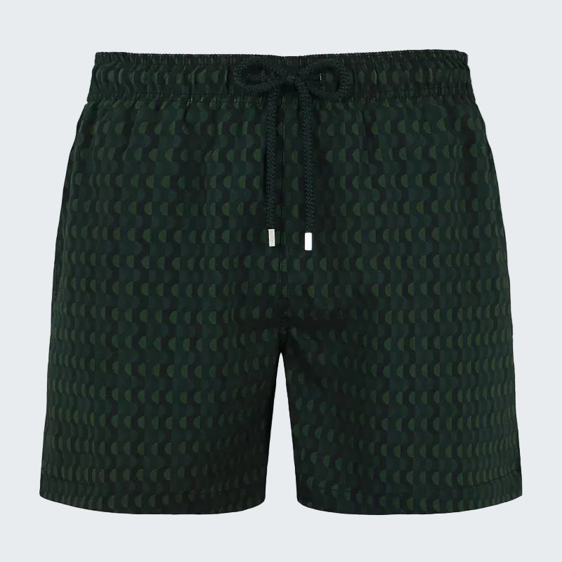 Dark green shorts with a subtle pattern on a white background