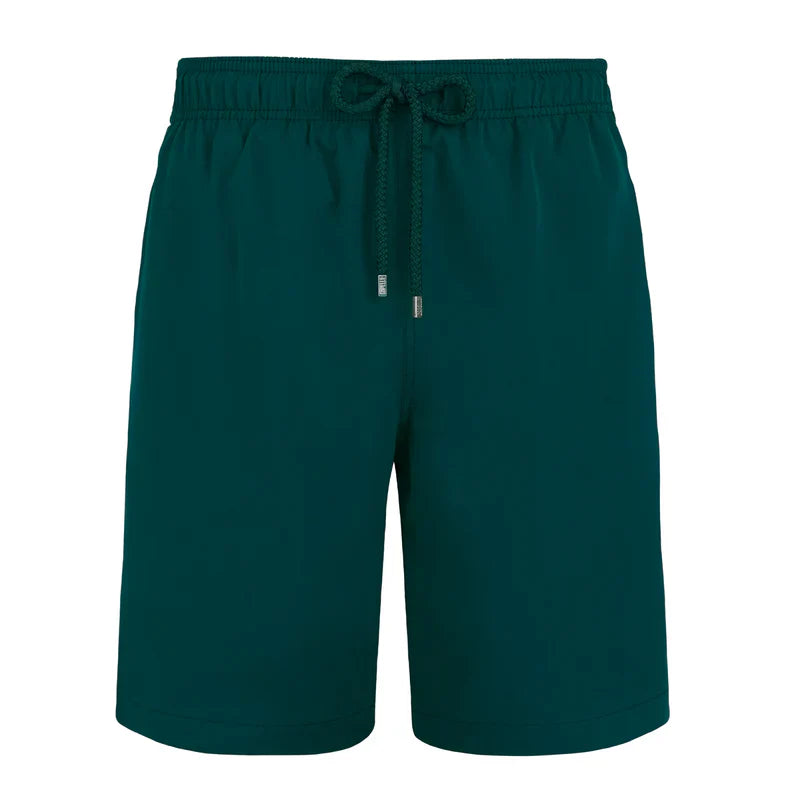 Teal shorts with drawstring on a white background