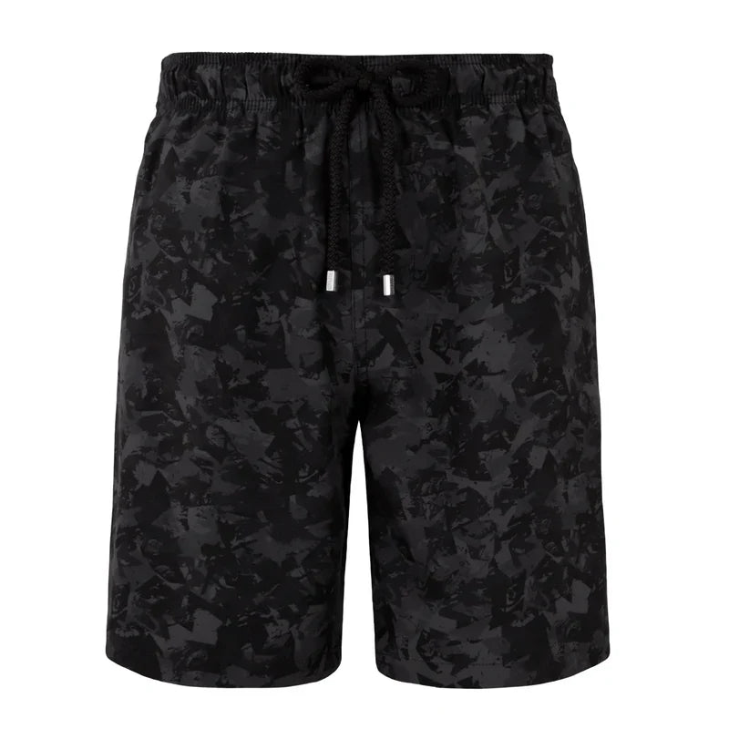 Black camouflage shorts on a white background