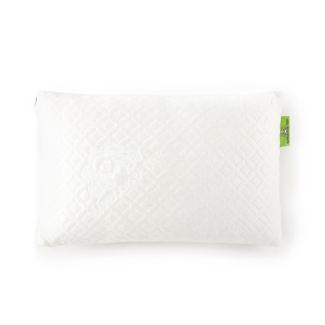 White pillow with a green tag on a white background
