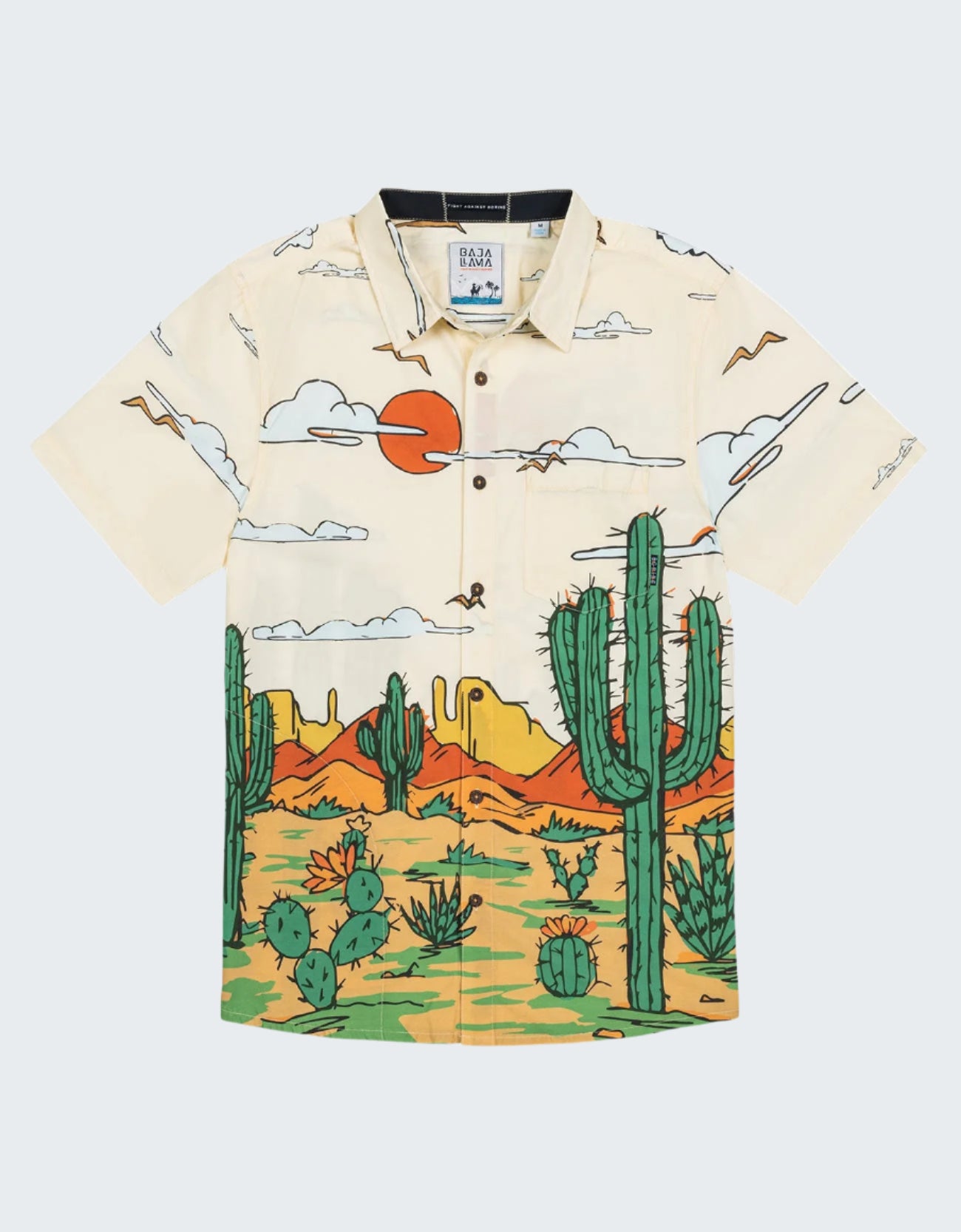 Beige shirt with desert landscape and cactus print on a white background