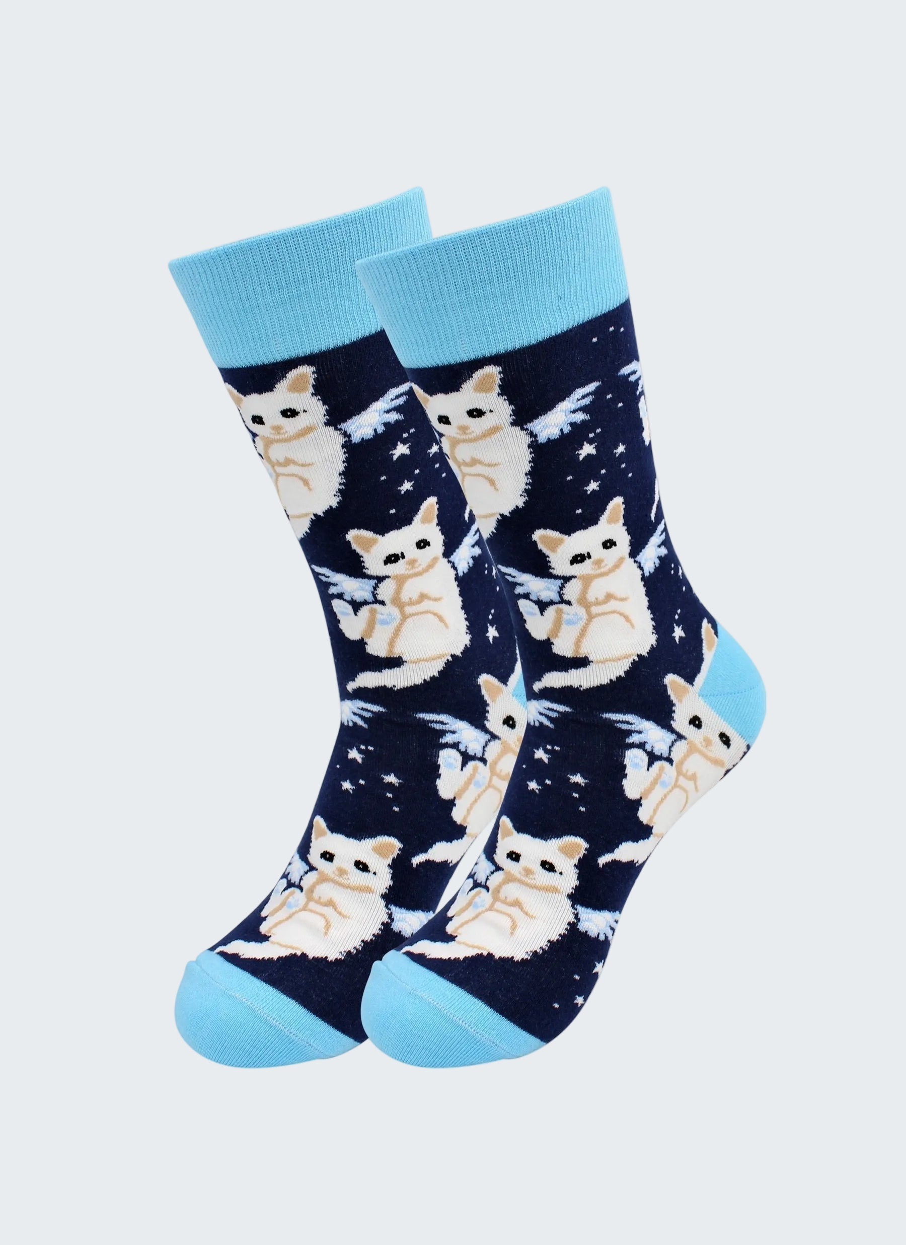 Navy socks with white cat pattern and light blue toes and cuffs on a white background