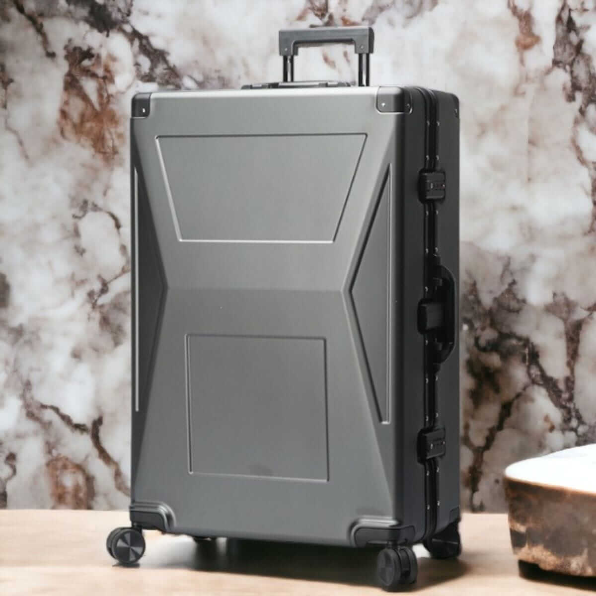 Gray suitcase on a marble surface