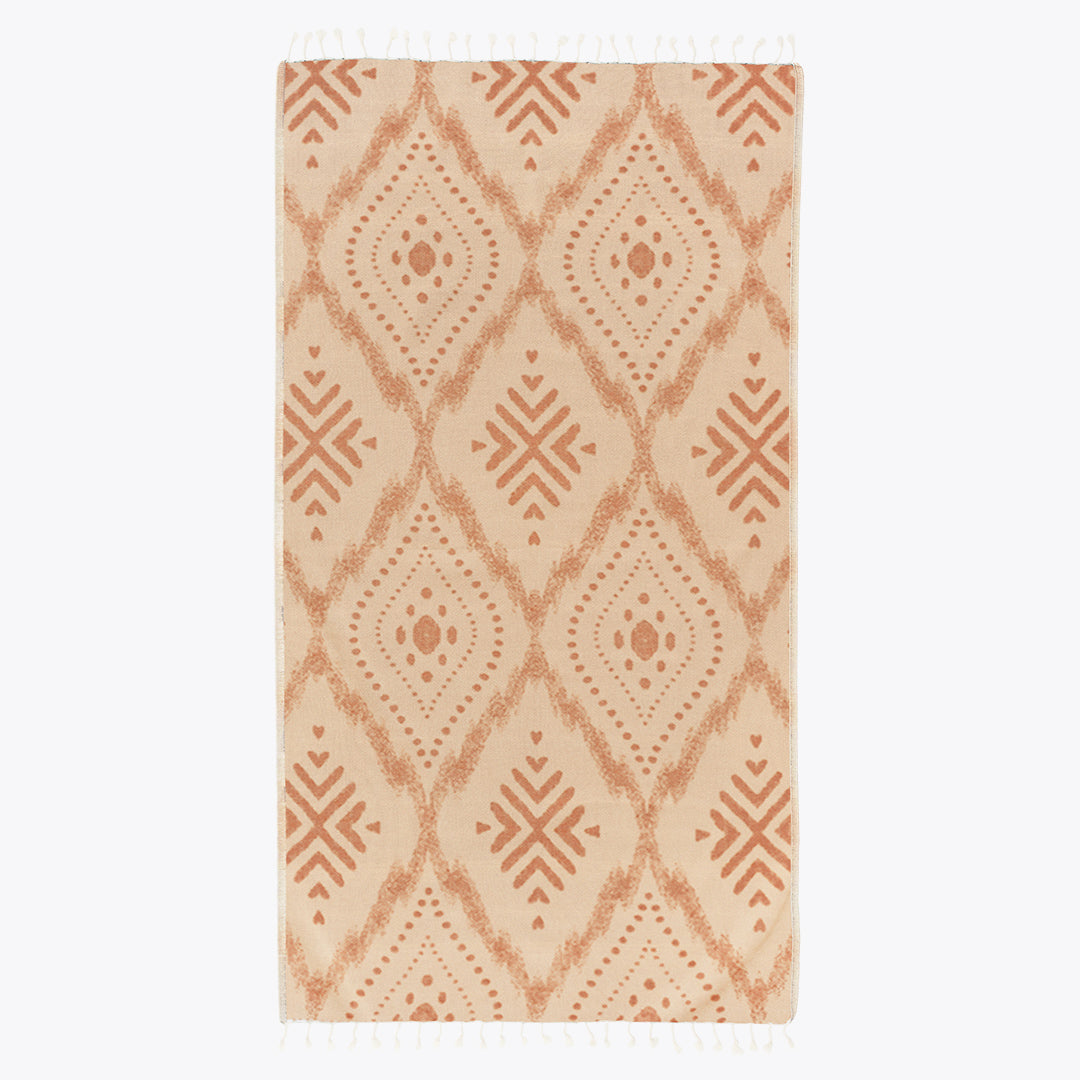 Rectangular area rug with geometric pattern on a plain background