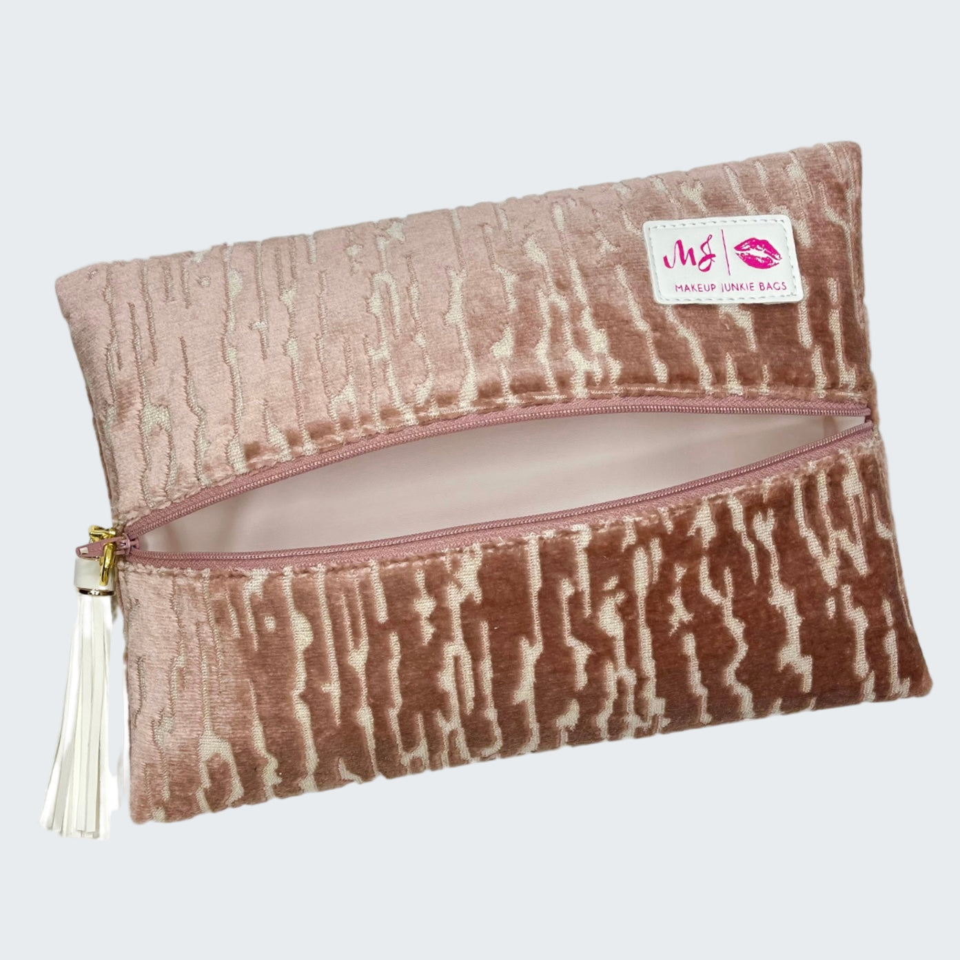 Makeup pouch with a patterned design and visible brand logo on a white background