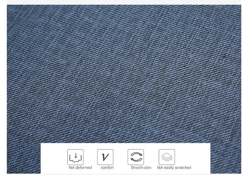 Close-up of blue denim fabric with text indicating fabric properties.