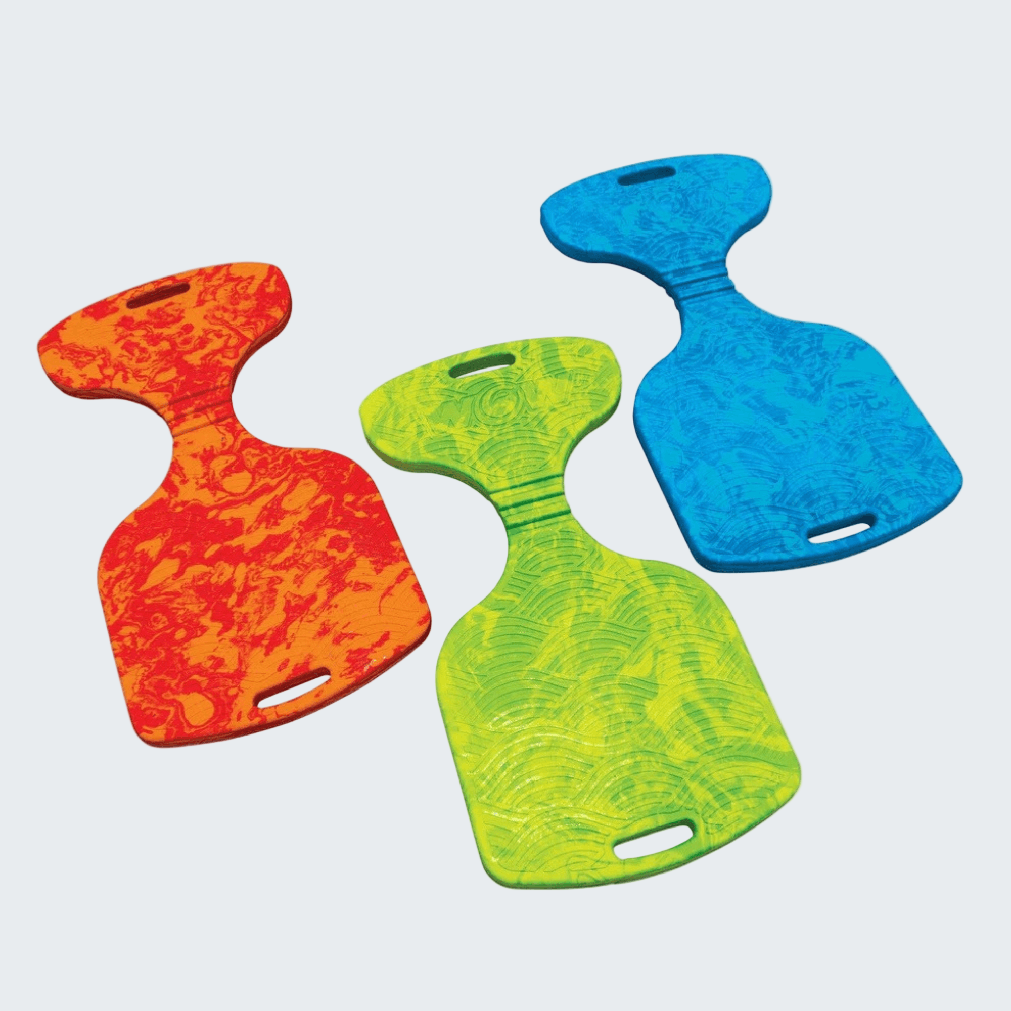 Three colorful plastic paddles in red, green, and blue on a white background