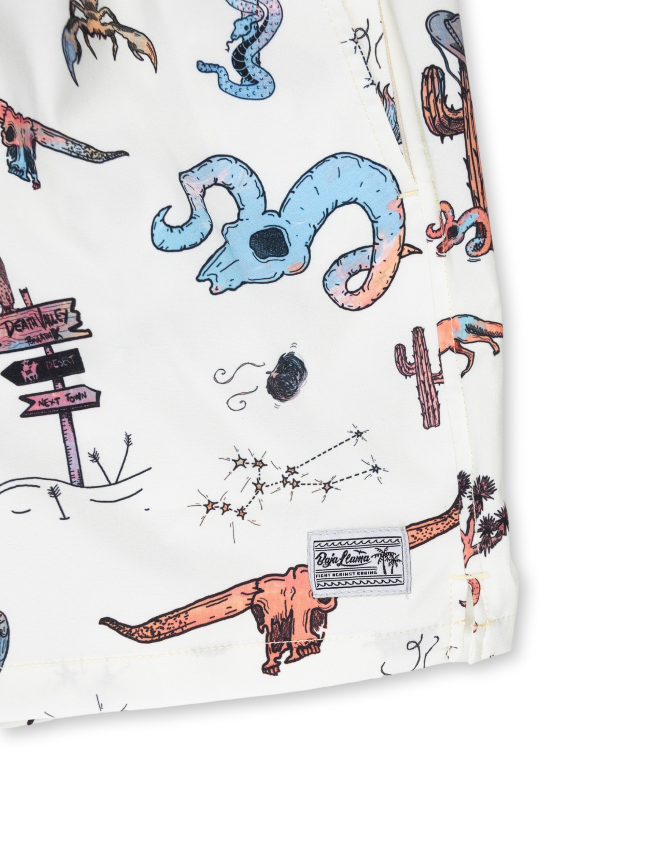 Close-up of a patterned fabric with illustrations and text on a white background