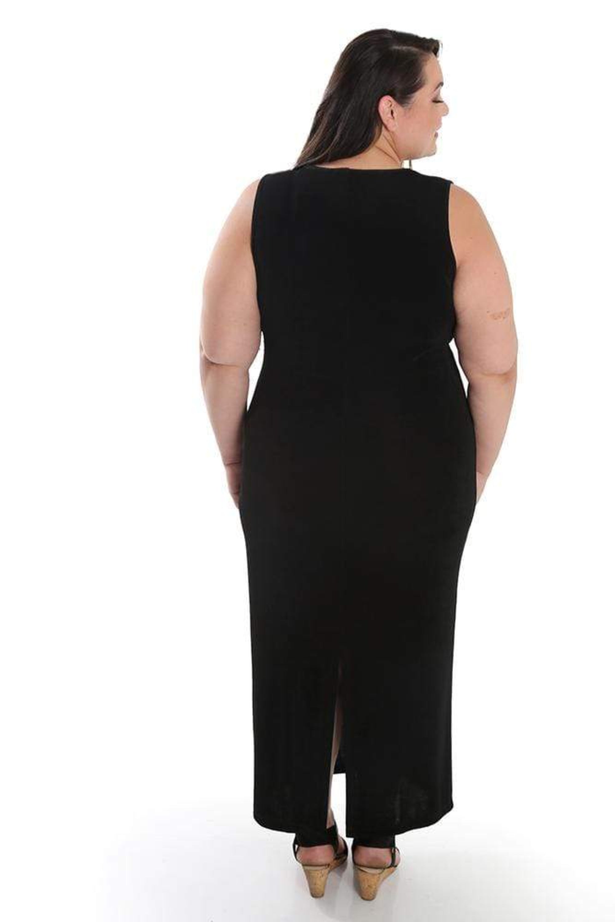 Woman wearing a black sleeveless dress on a white background