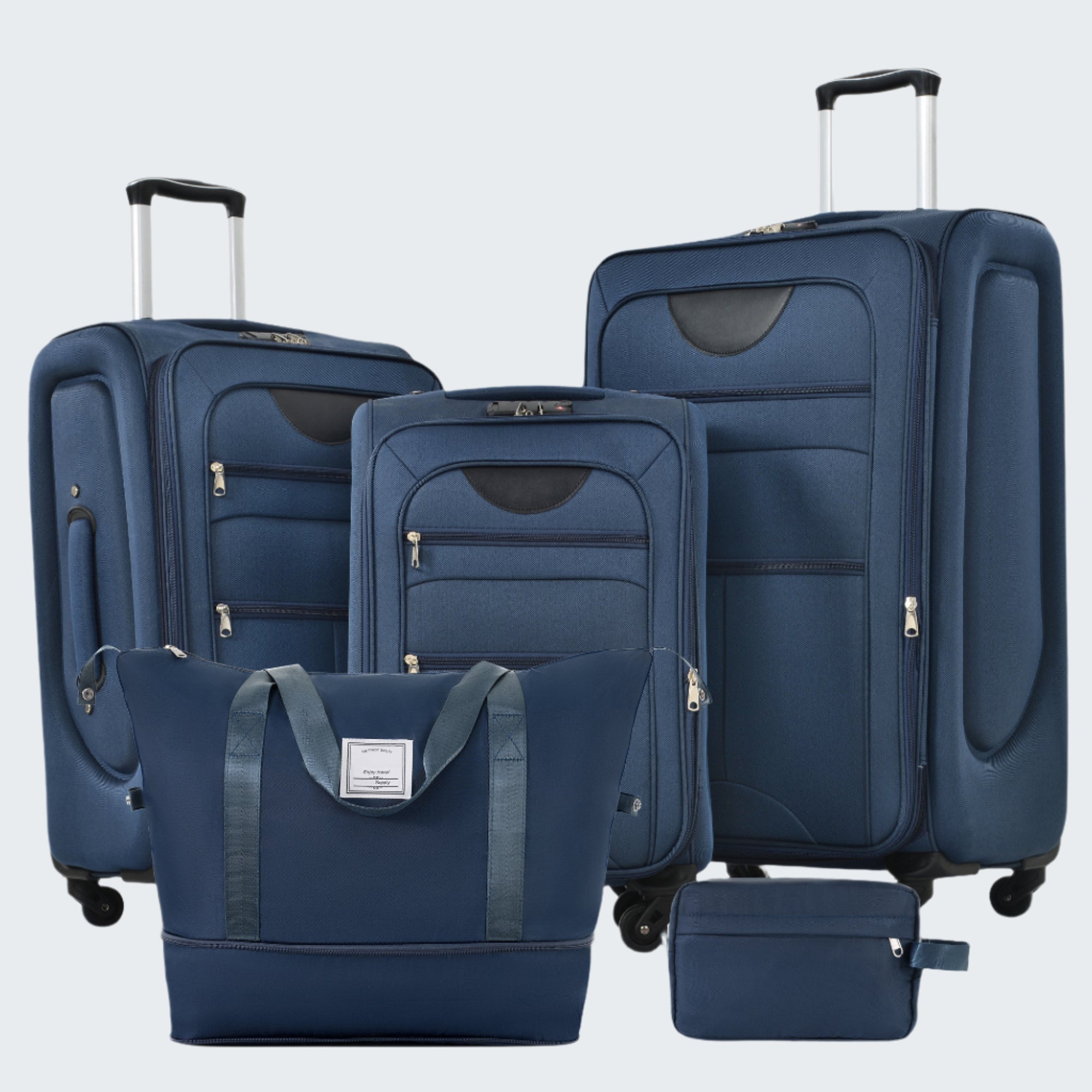A set of navy blue softside luggage which includes a 20-inch, 24-inch, and 28-inch suitcase with spinner wheels, a duffel bag, and a toiletry bag.