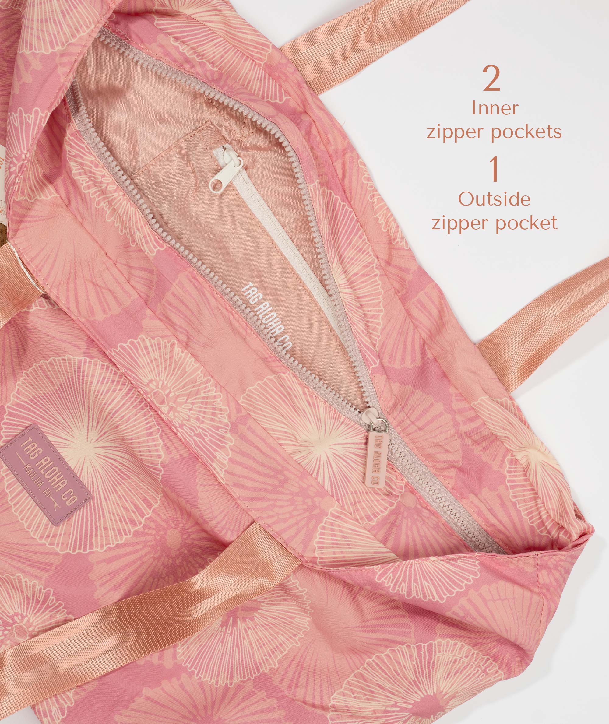 Pink jacket with zipper details on a white background