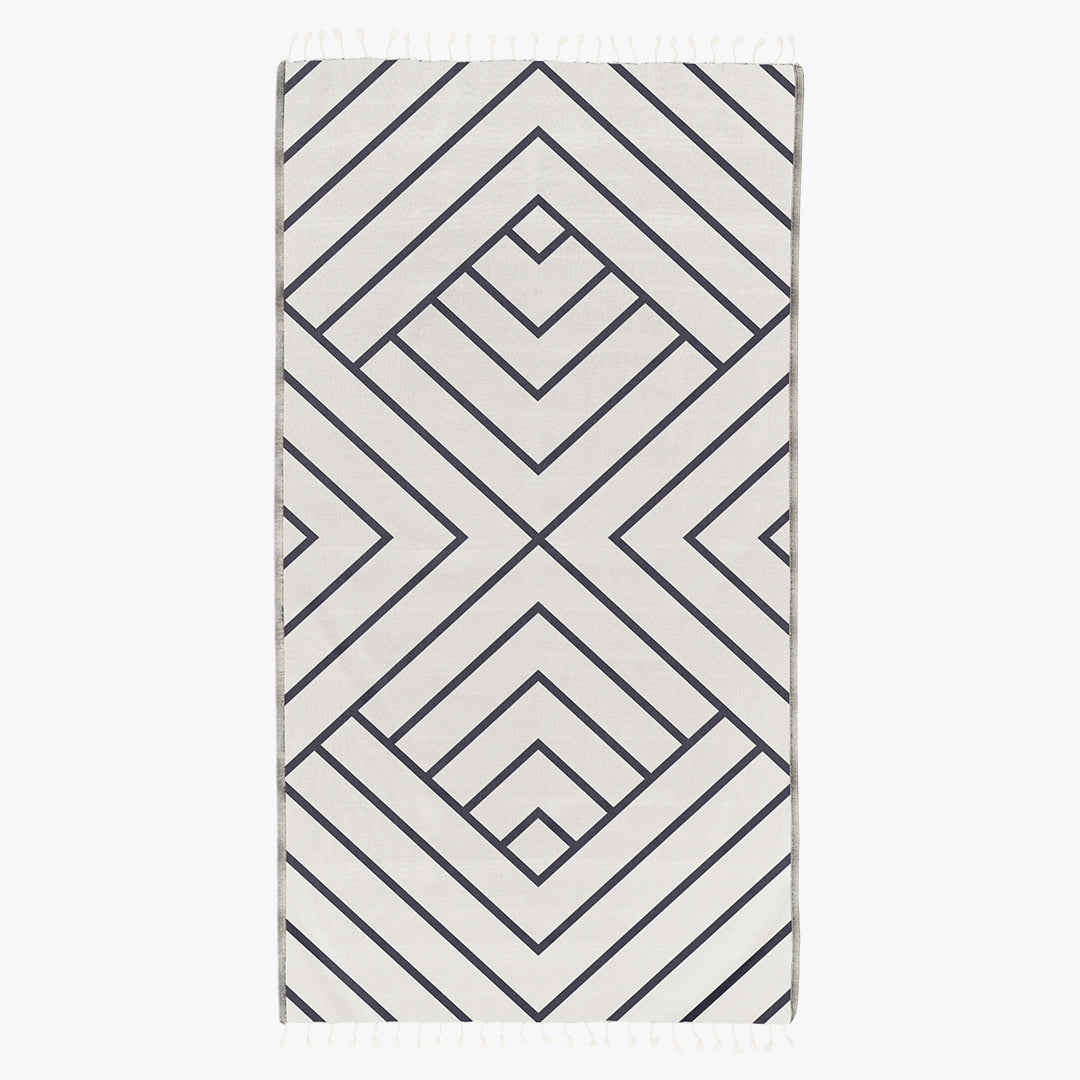 Rectangular area rug with geometric pattern on a white background