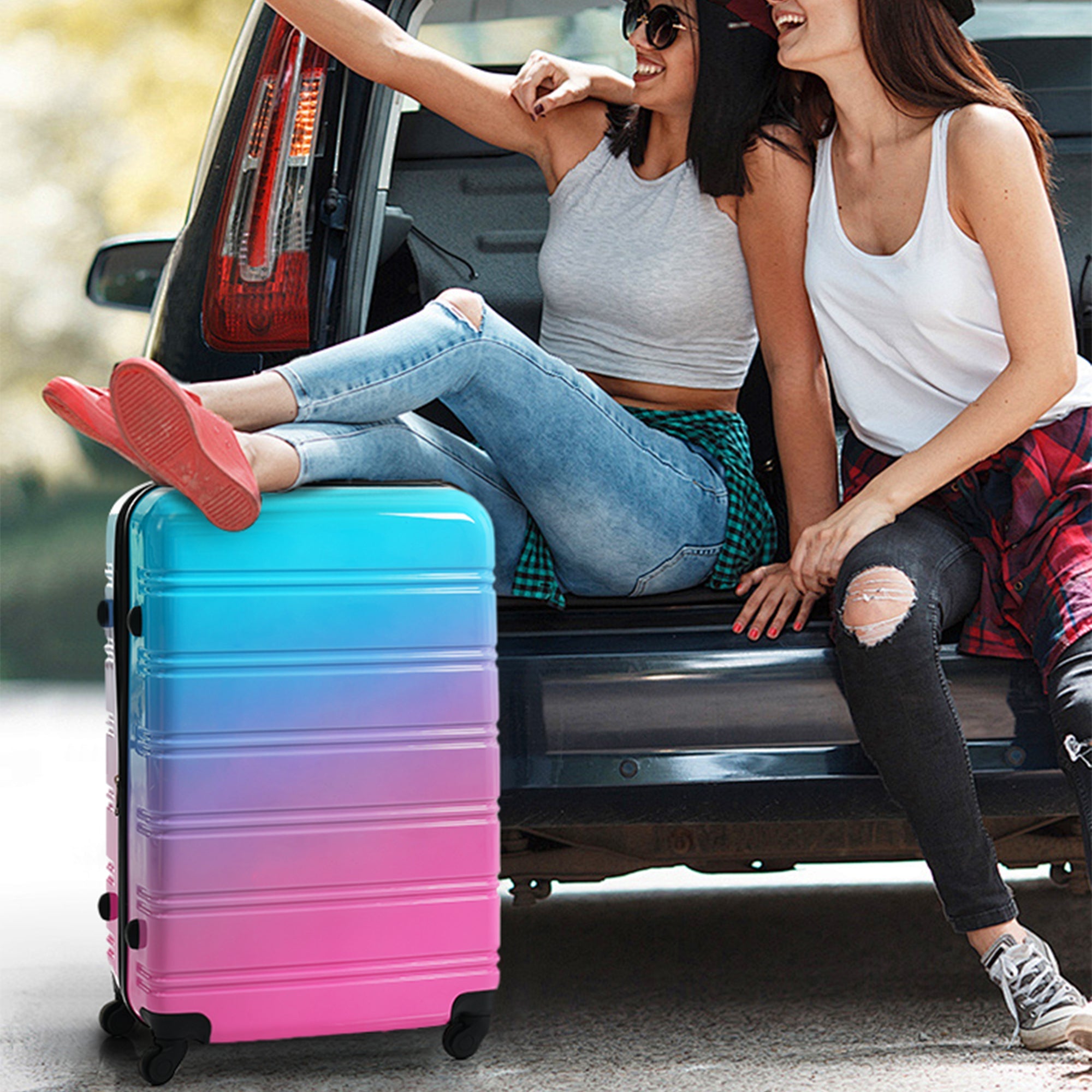 Blue and Pink Three Piece Hardshell Luggage Set