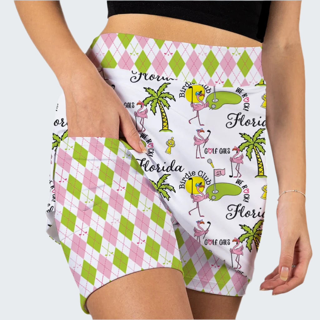 Shorts with Florida-themed design featuring flamingos, palm trees, and checkered patterns.