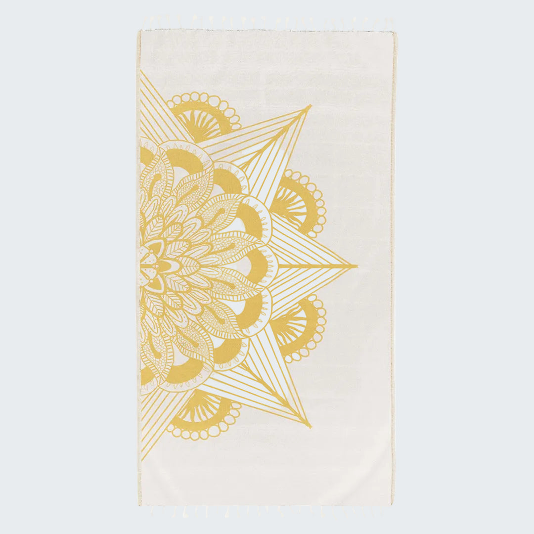 Beige towel with yellow geometric pattern on a white background