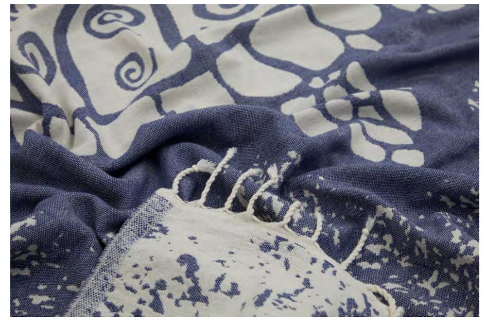 Navy blue fabric with white abstract patterns