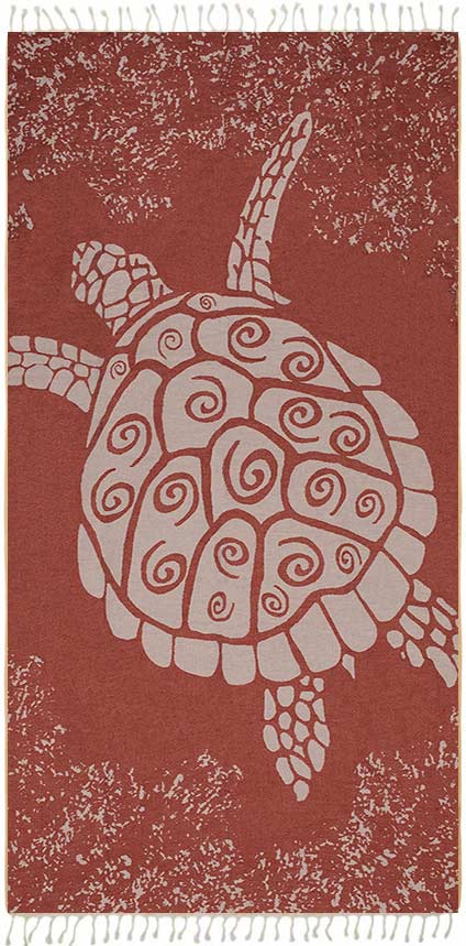 Towel with a turtle design on a red background