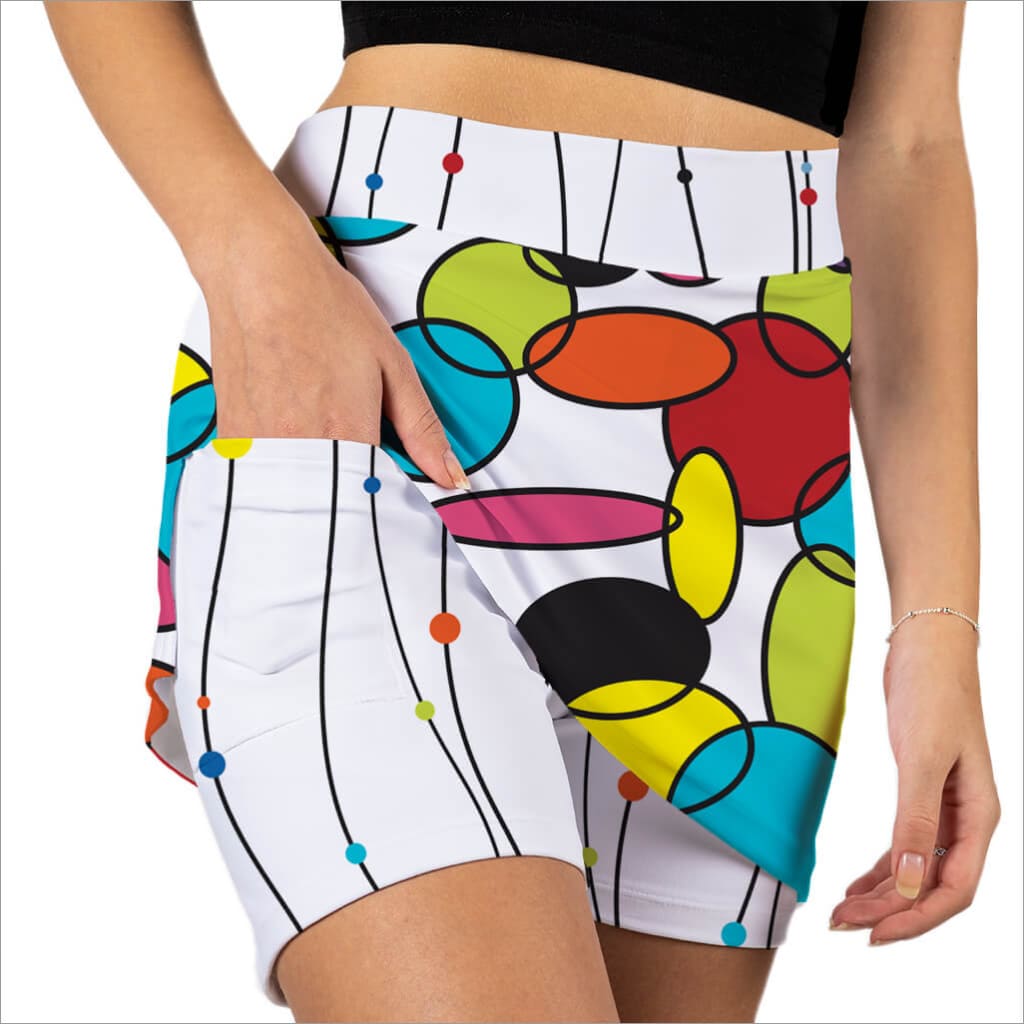 Colorful abstract patterned shorts on a white background