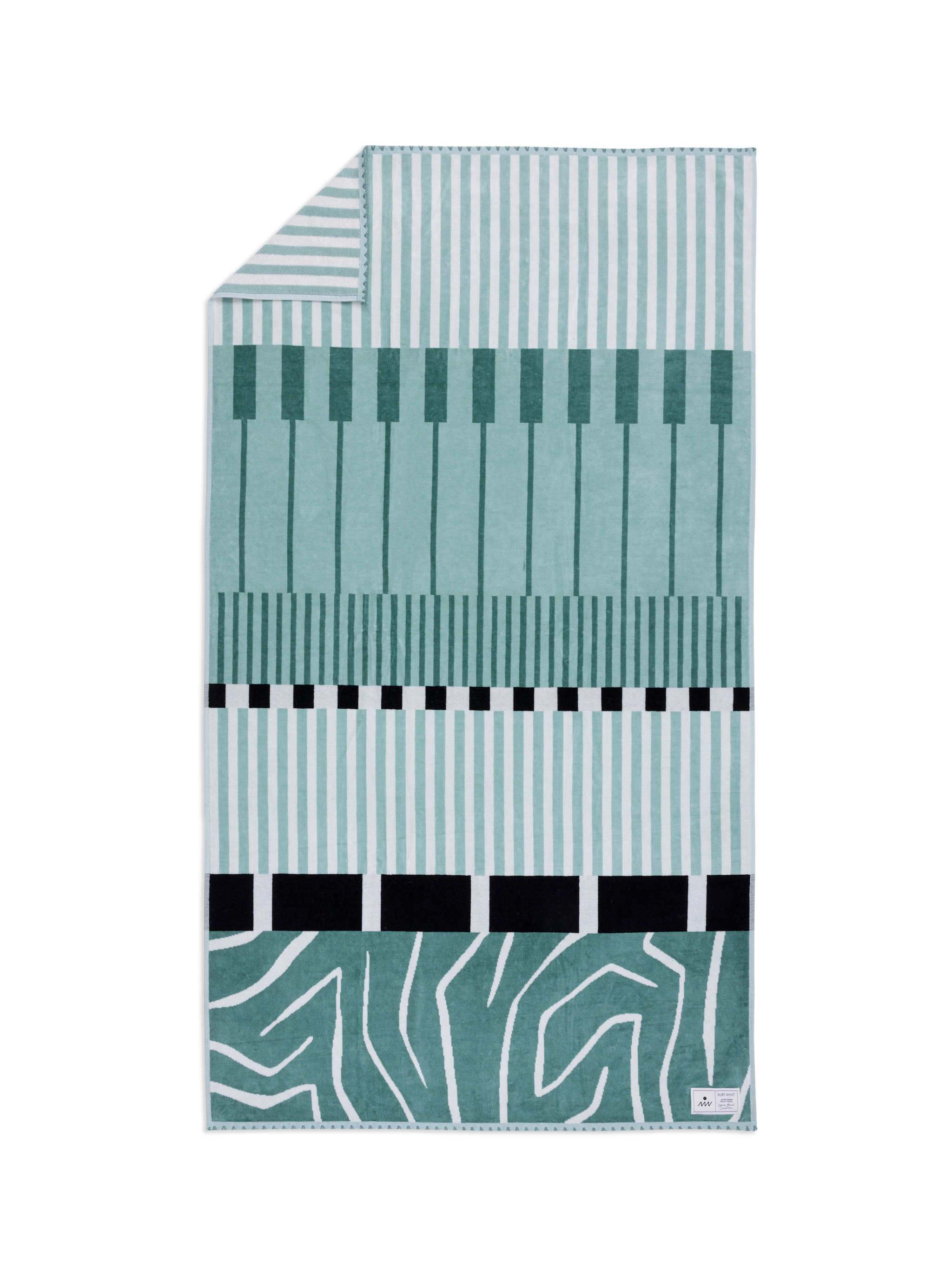 Teal and white patterned towel on a white background
