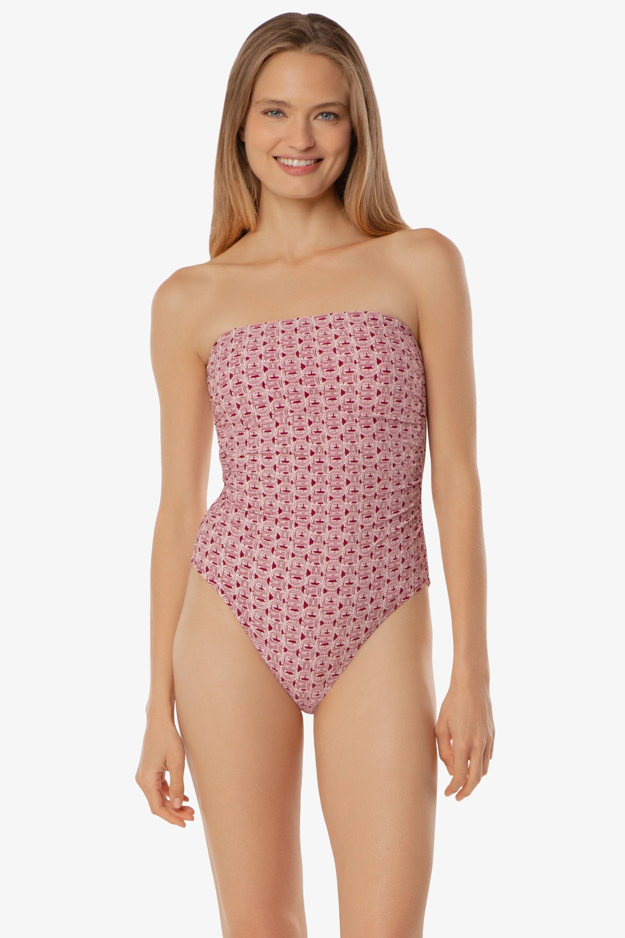 Woman wearing a strapless floral swimsuit on a white background