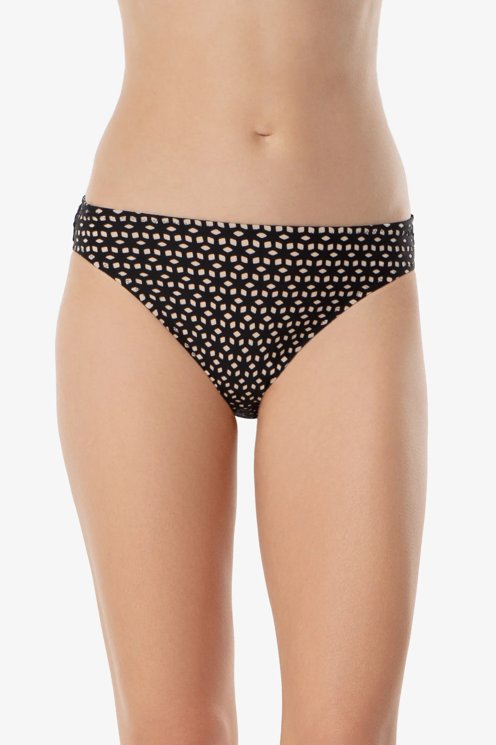 Black polka dot bikini bottom on a white background