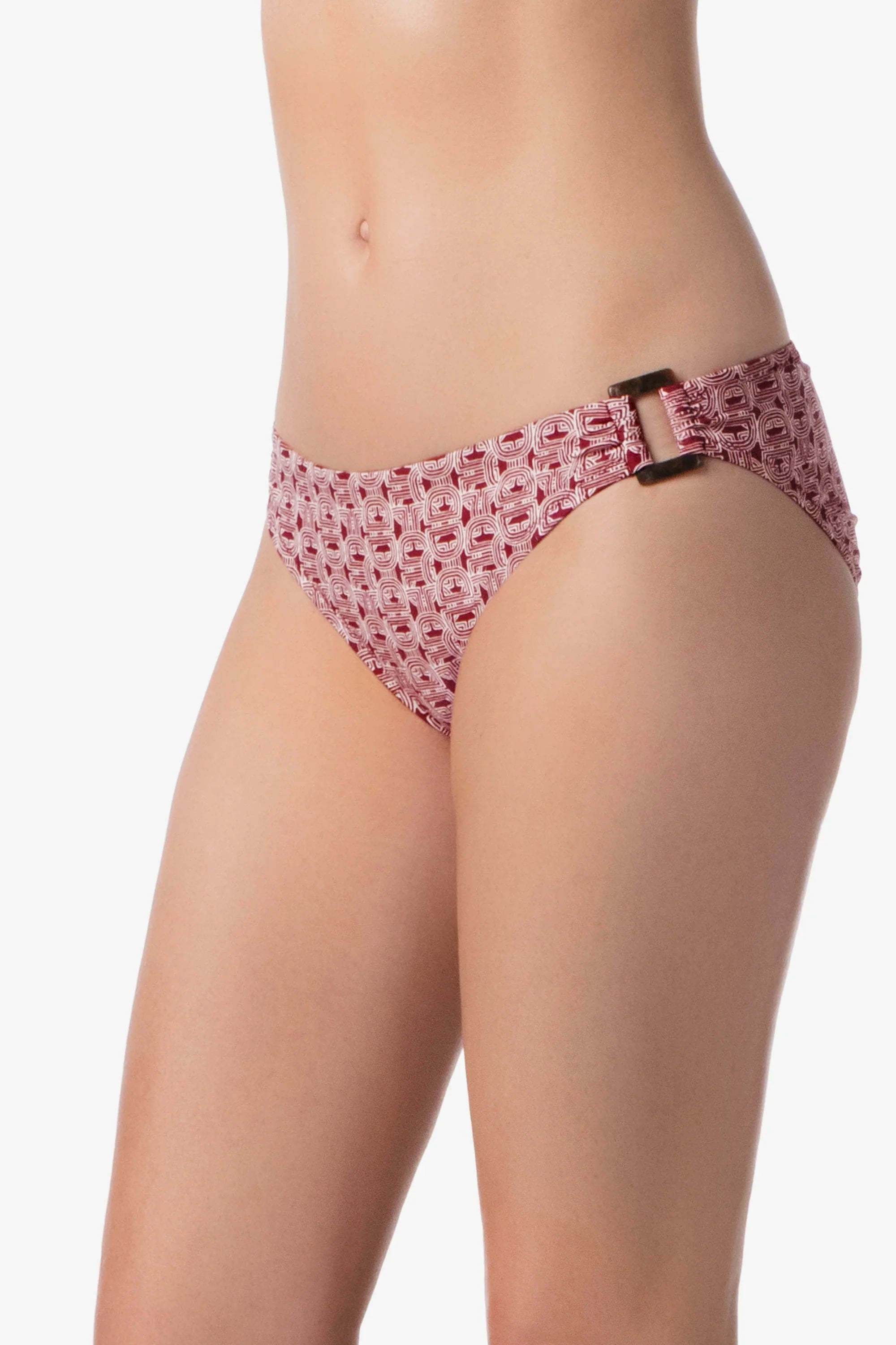 Pink floral-patterned underwear with a black buckle on a white background