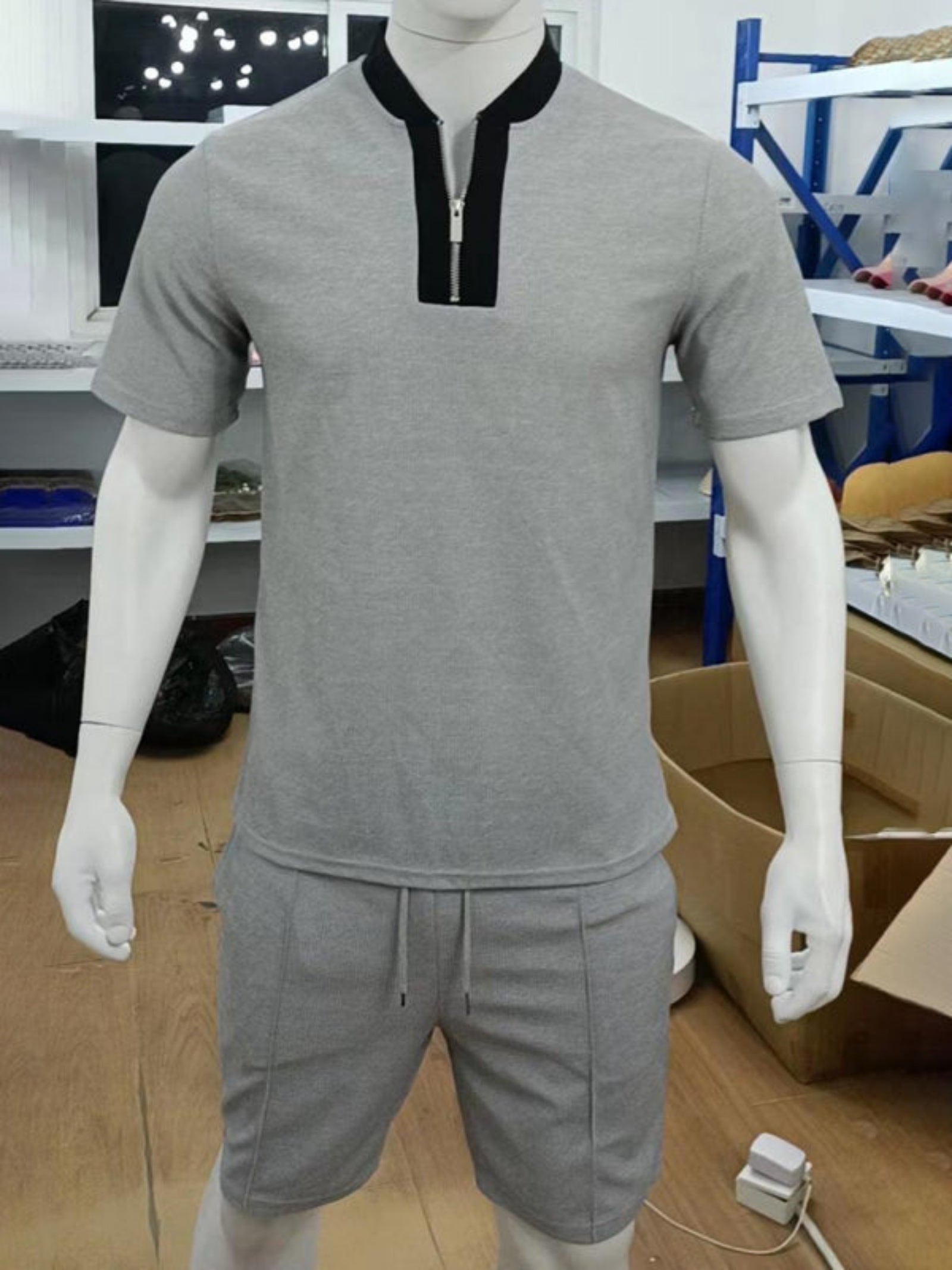 gray shorts and shirt