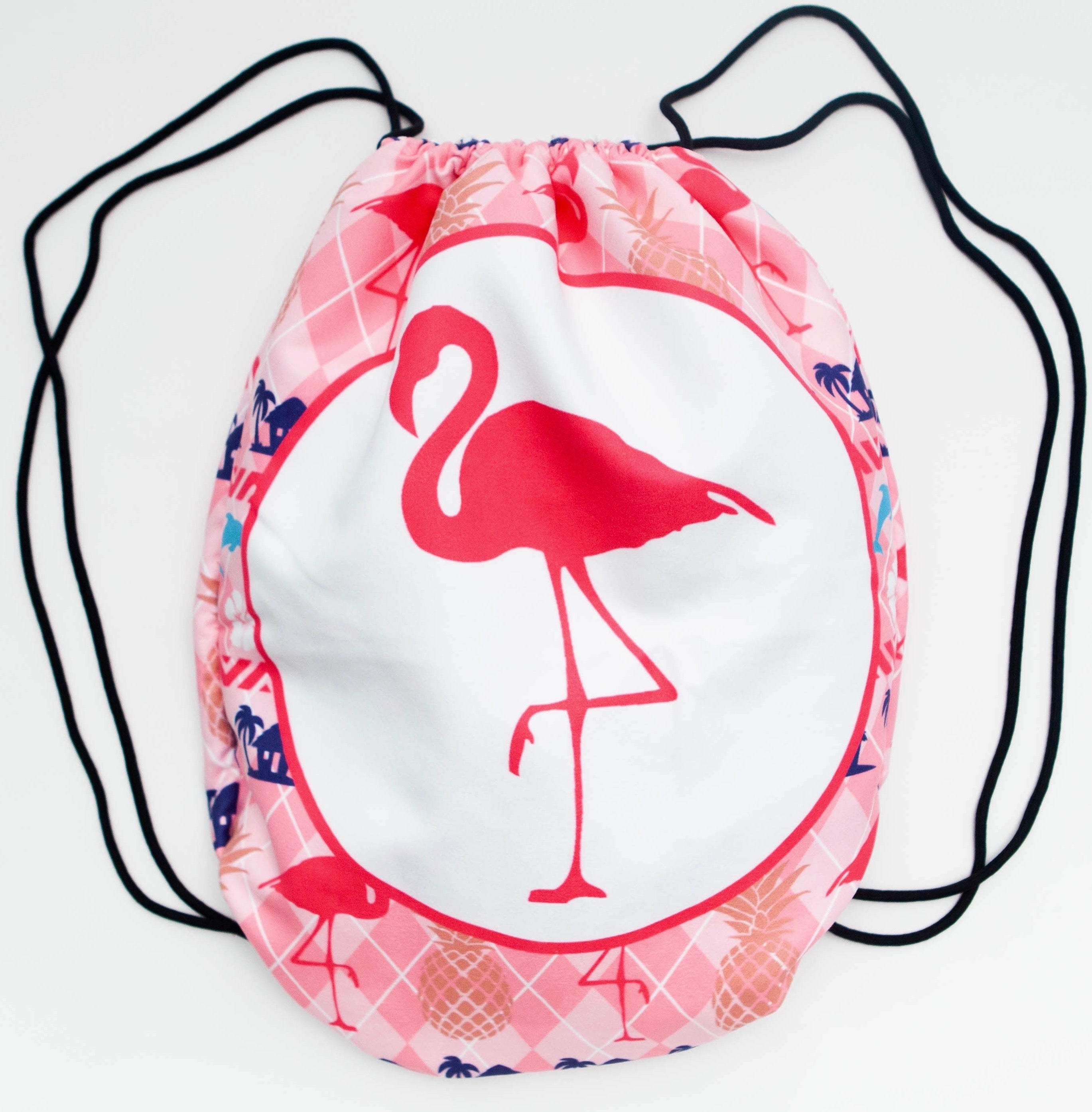 Drawstring bag with pink flamingo design on a white background