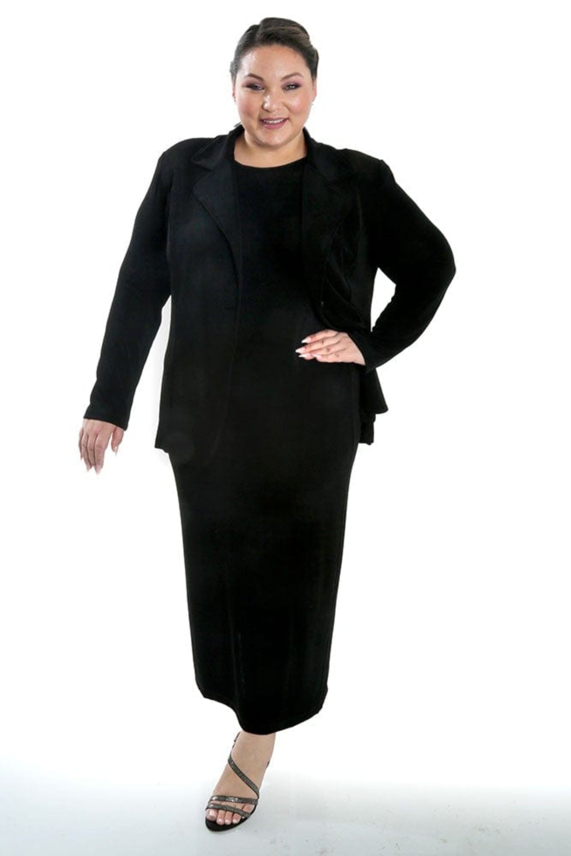Woman wearing a black suit on a white background