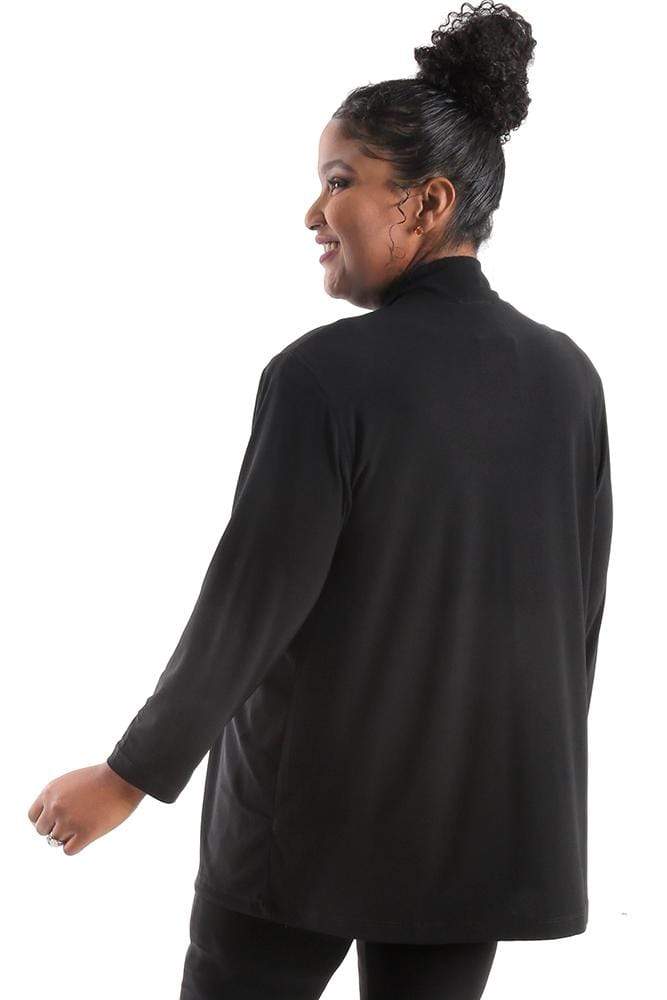 Person wearing a black long-sleeve top on a white background