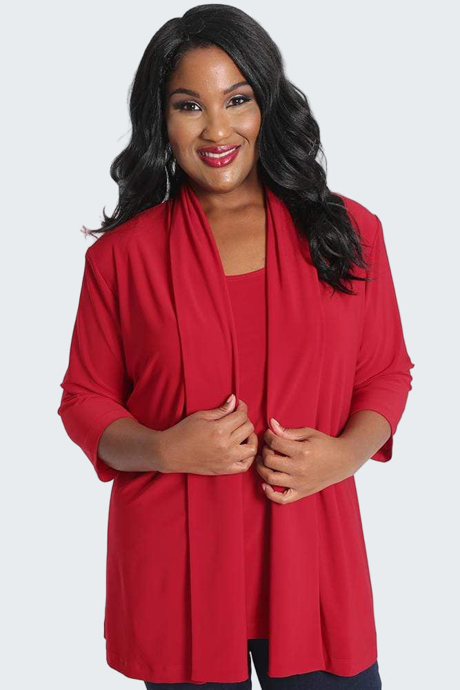 Woman wearing a red cardigan on a white background