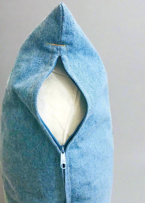 Blue fabric pouch with a zipper on a gray background