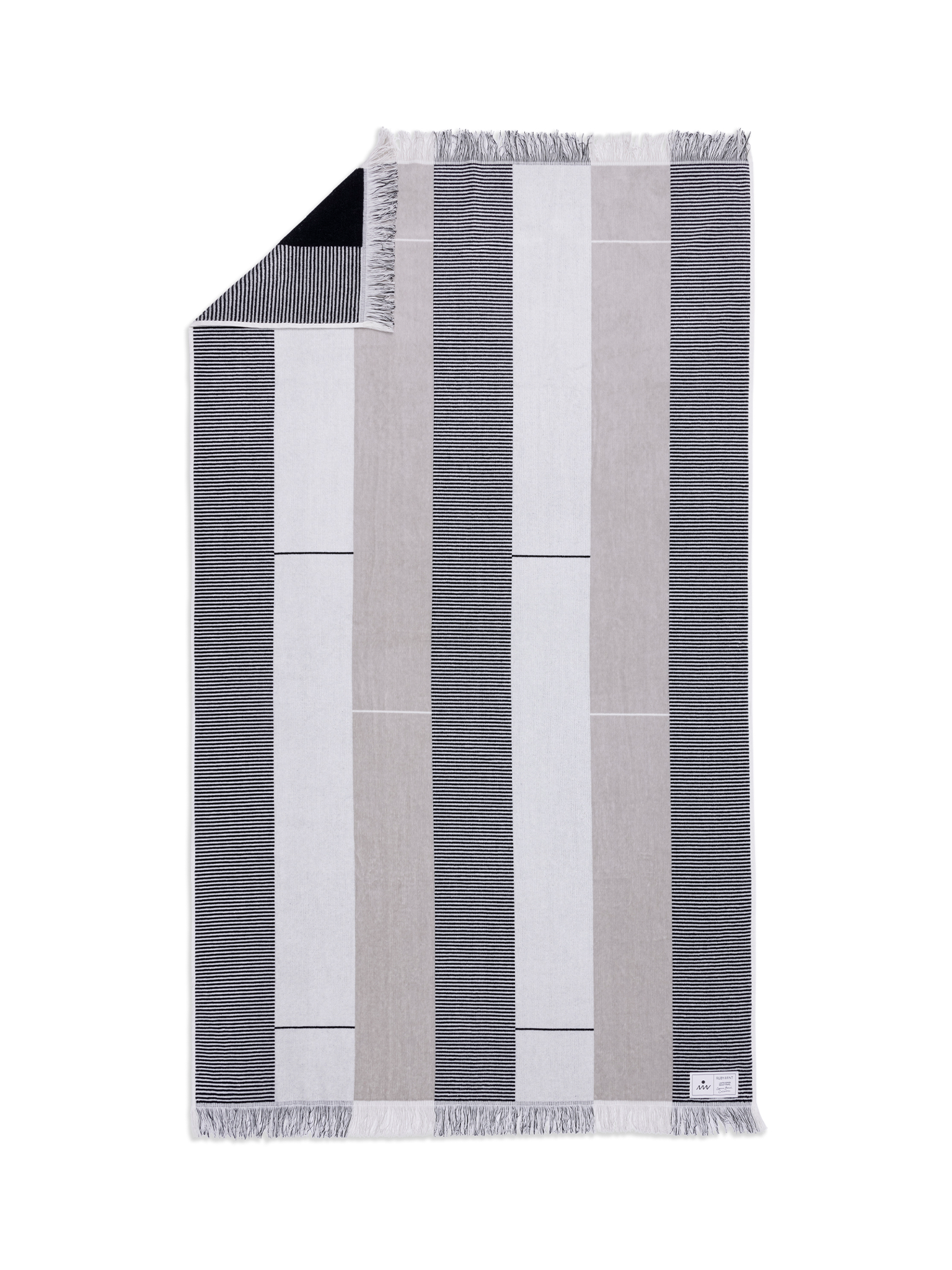 Striped towel with black, gray, and white stripes on a white background
