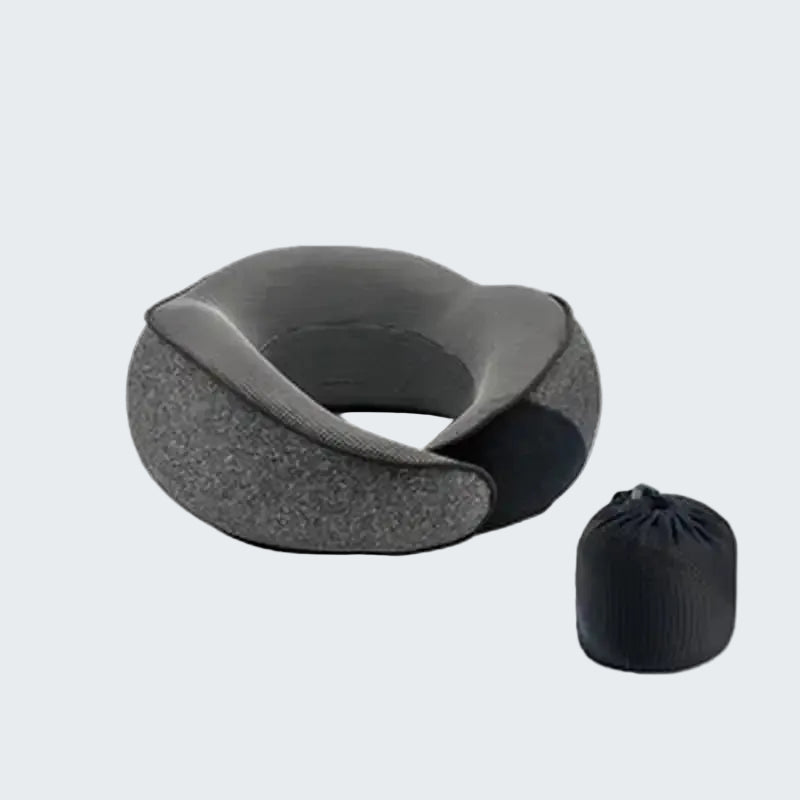Gray travel neck pillow with a black storage bag on a white background