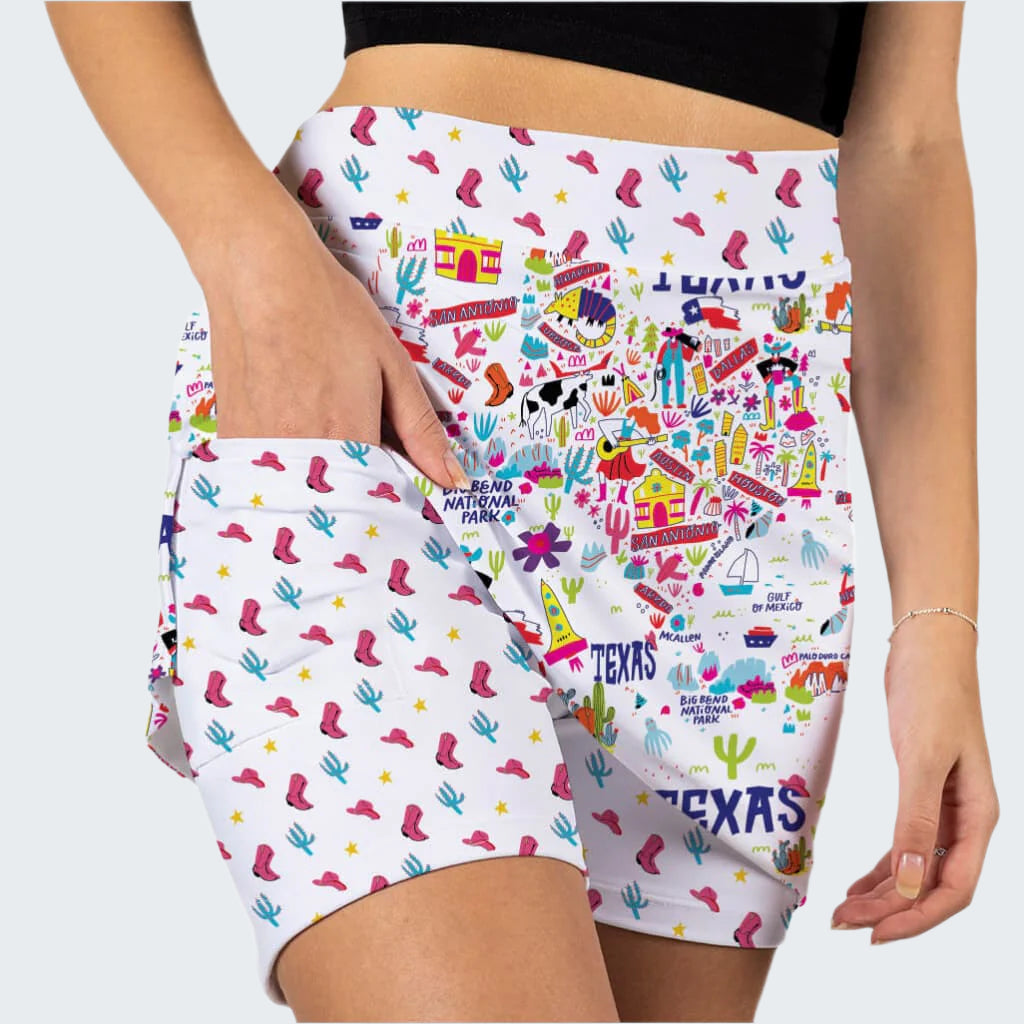 Colorful Texas-themed shorts with various patterns on a white background