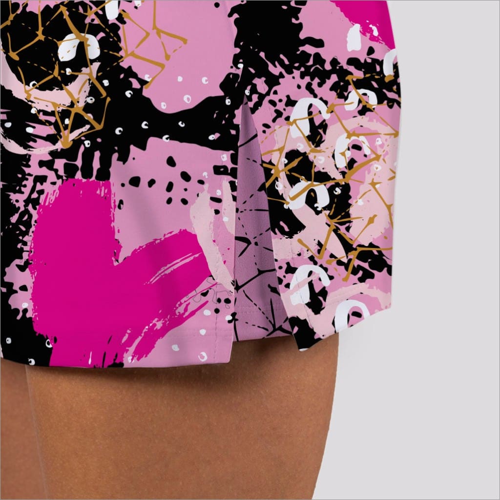 Abstract design with pink, black, and gold on a product packaging.
