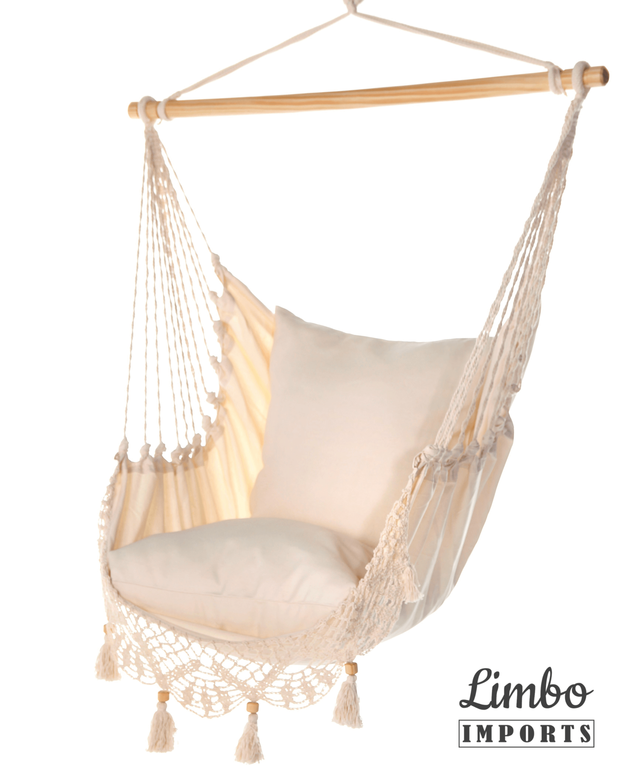 Beige hammock chair with tassels and a pillow, hanging from a wooden rod, on a white background with 'Limbo Imports' branding.