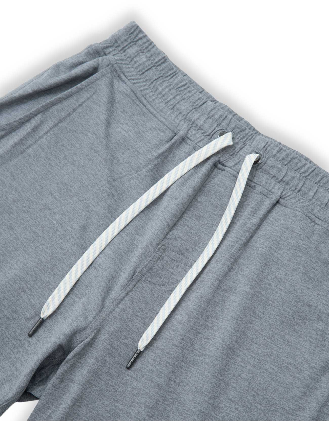 Gray shorts with drawstring on a white background