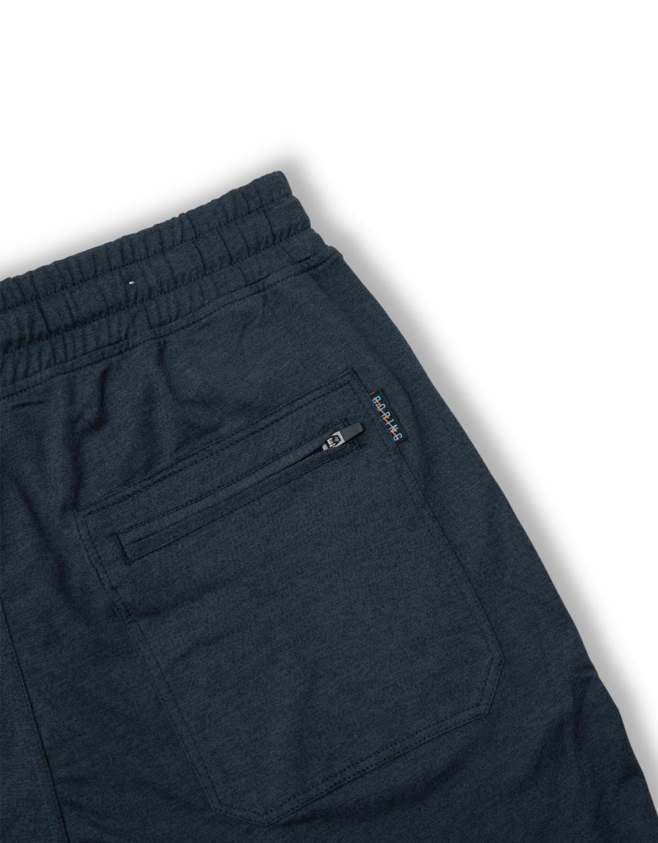 Navy blue pants with a pocket and zipper on a white background