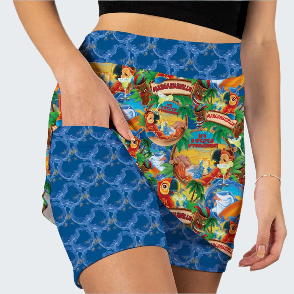 Colorful shorts with tropical design and blue patterned waistband.