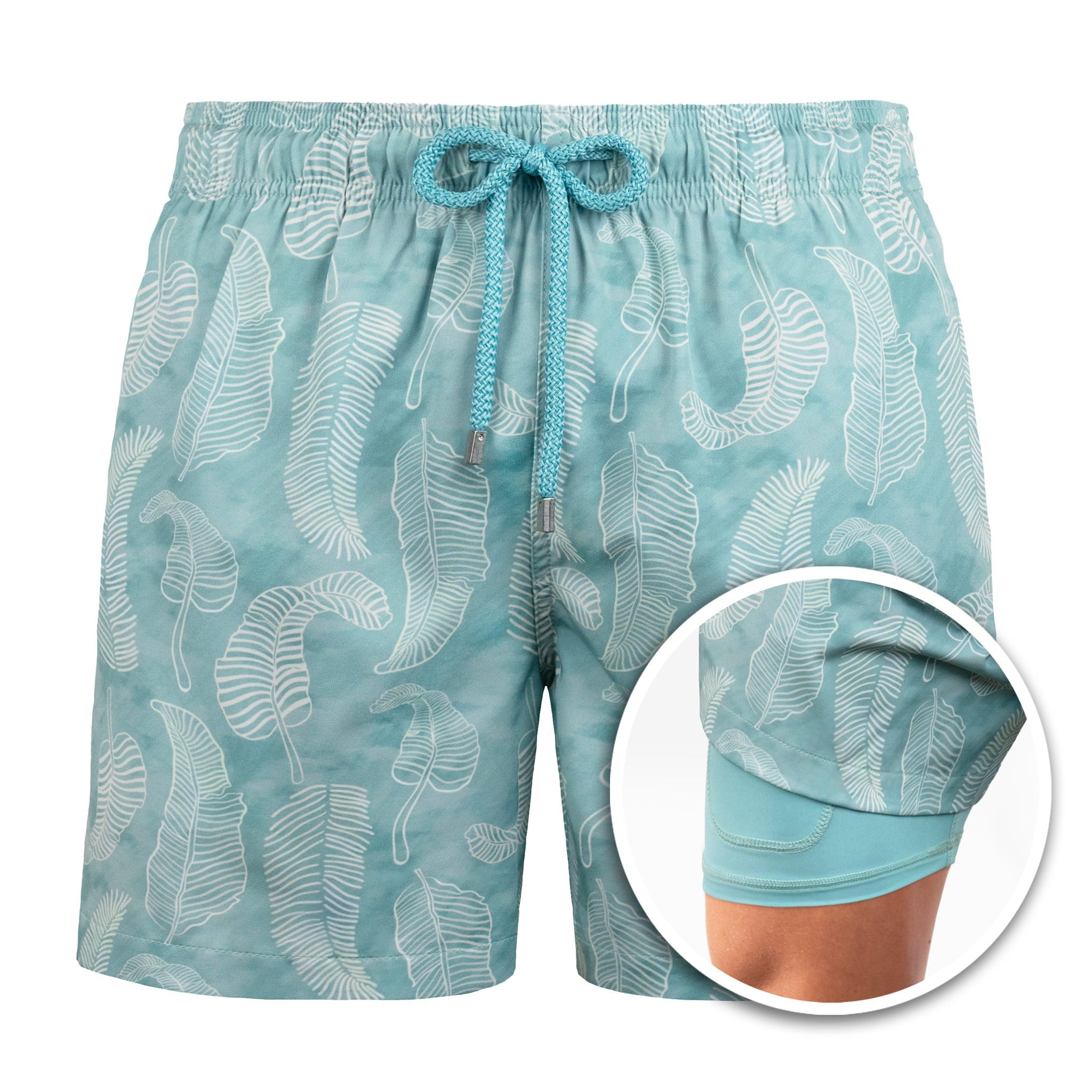 Teal swim shorts with white leaf pattern on a white background