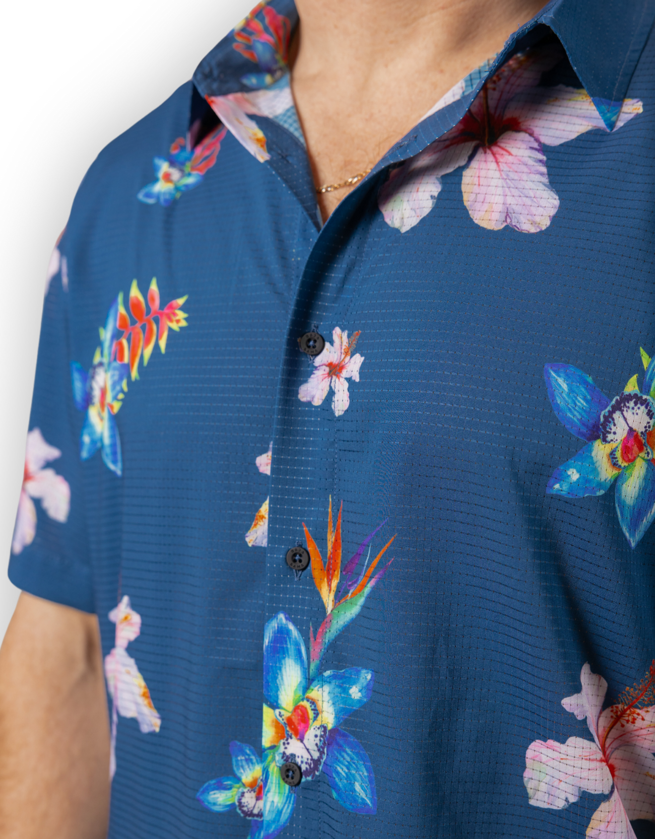 Blue floral patterned shirt with colorful flowers on a white background