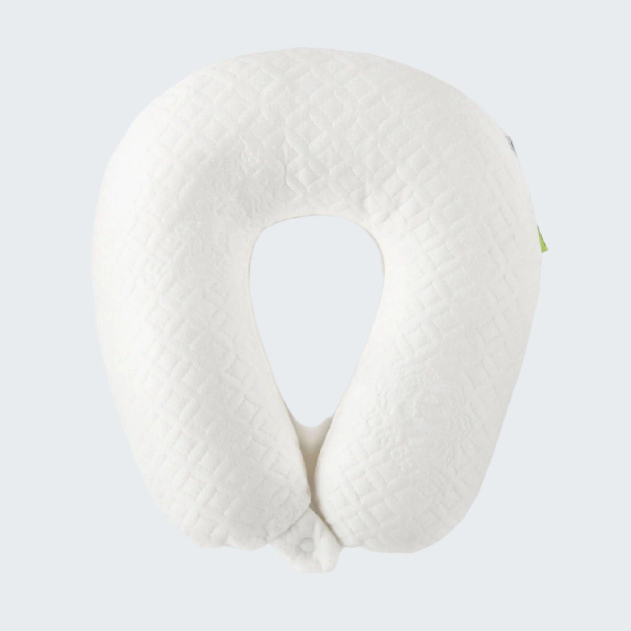 White U-shaped pillow on a white background