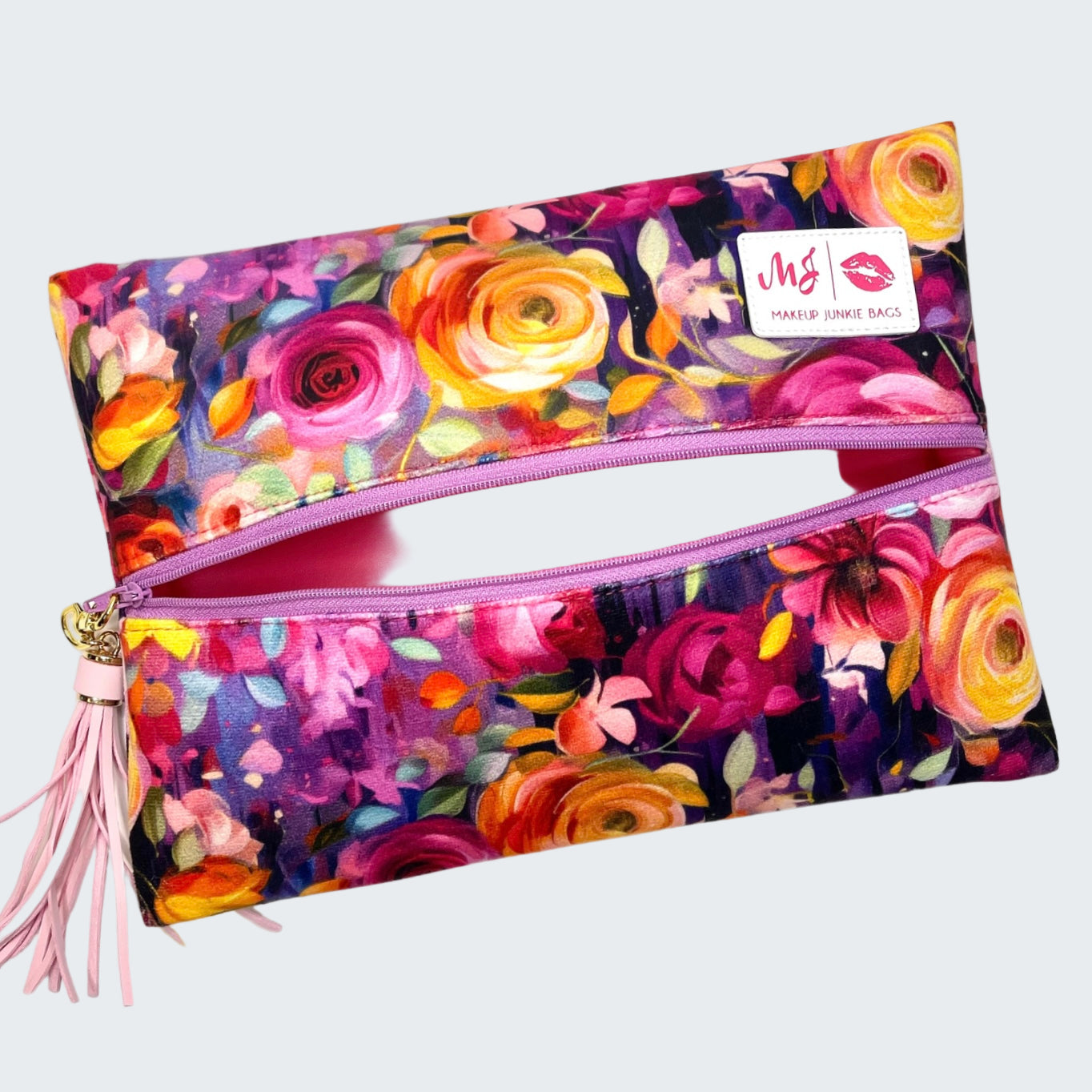 Floral-patterned pouch with a pink zipper and visible brand label on a white background