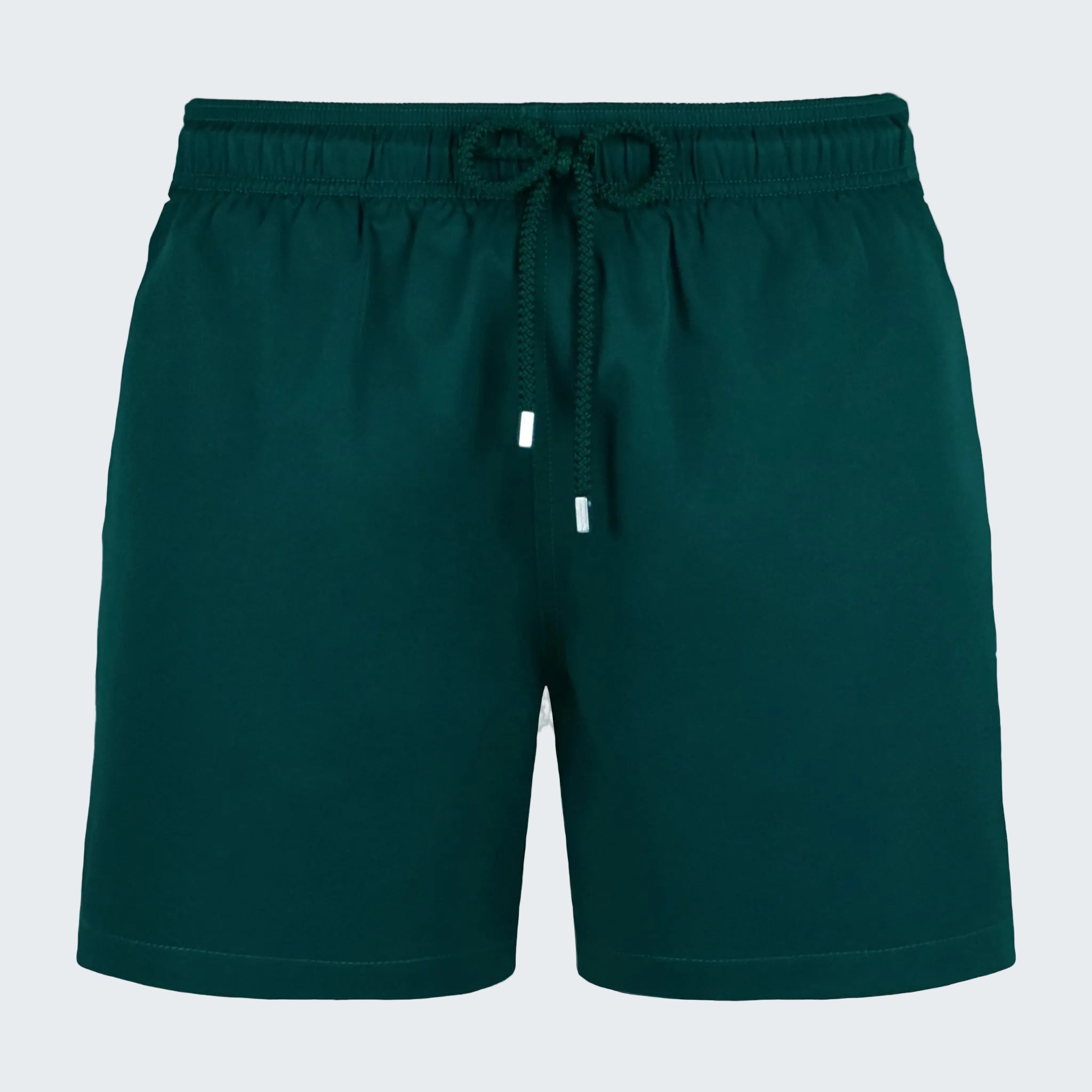 Green shorts with a drawstring on a white background