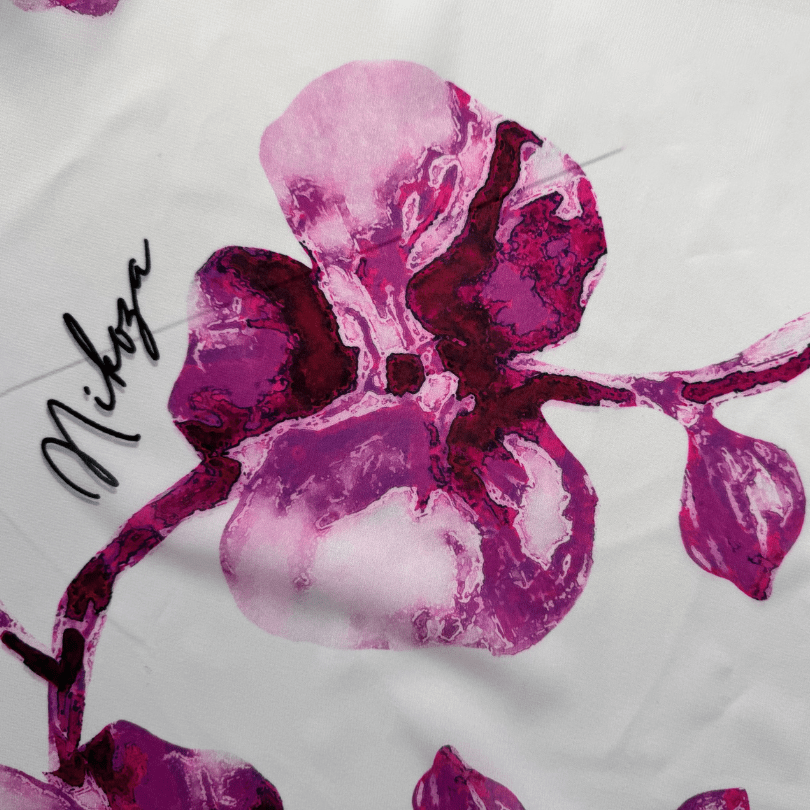 Pink floral design on a white background with 'Nikita' branding.