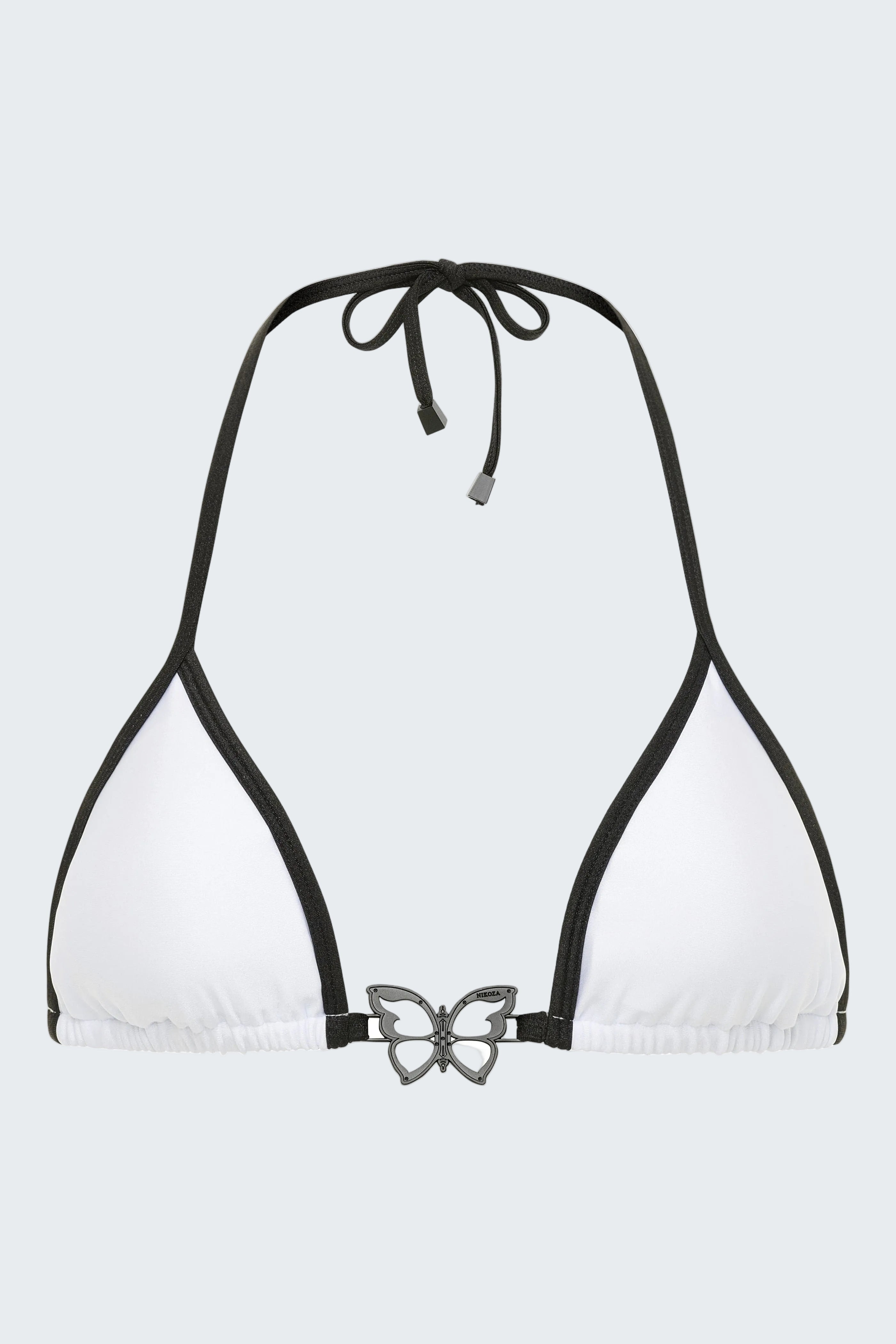 White bikini top with black straps and a decorative bow on a white background