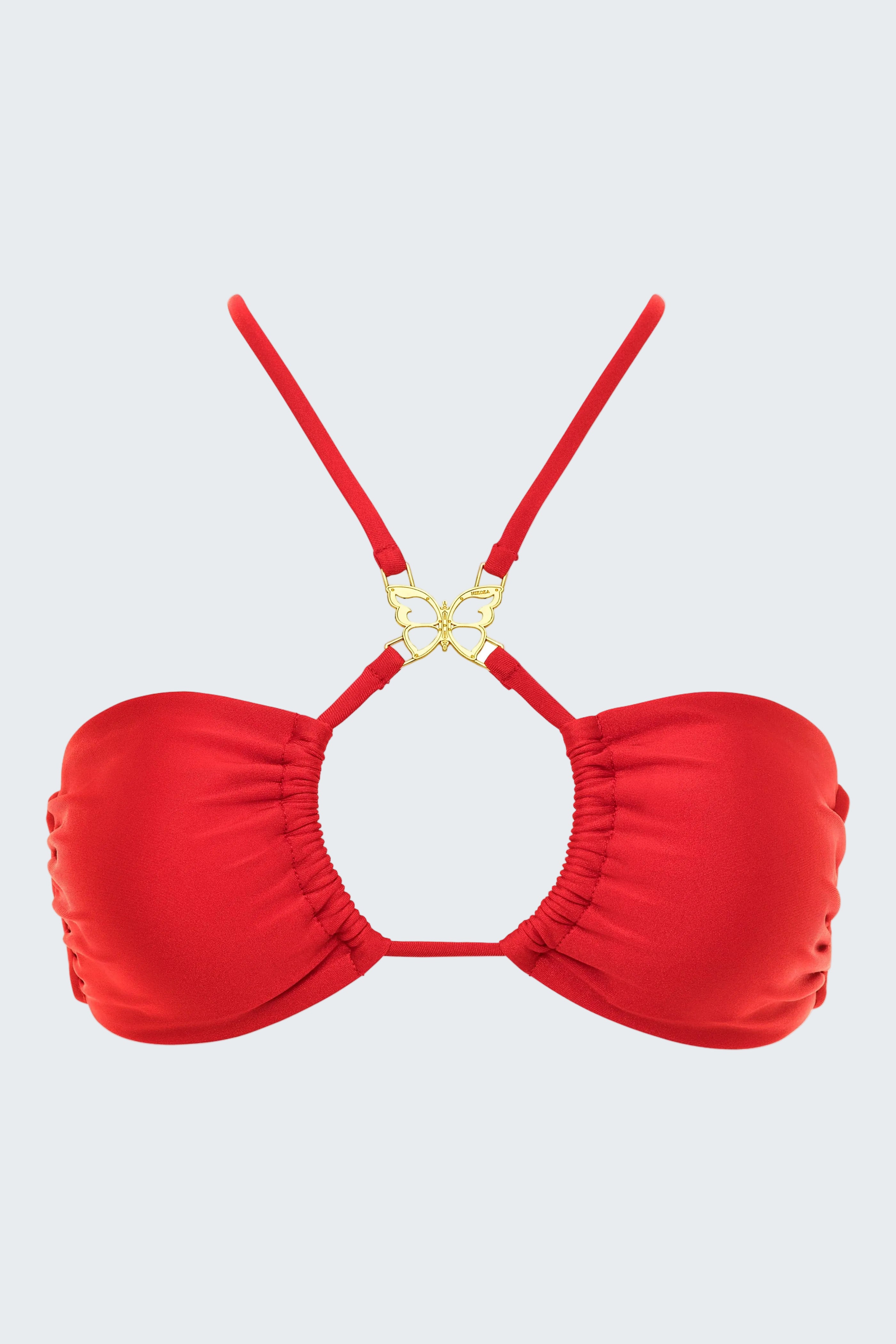 Red bikini top with gold clasp on a white background