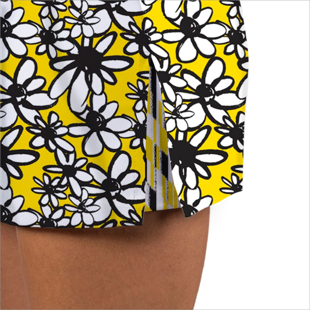 Floral-patterned shorts with a yellow background