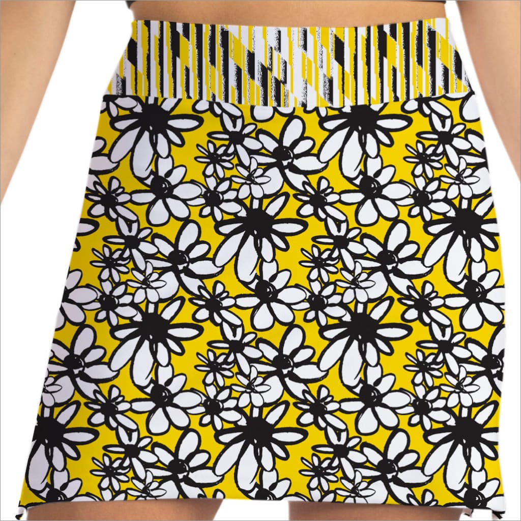 Skirt with black and white floral pattern on a yellow background